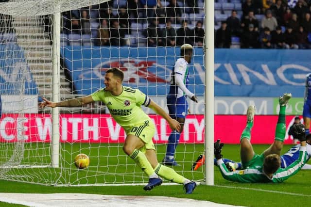 Billy Sharp scores his record-breaking goal at Wigan