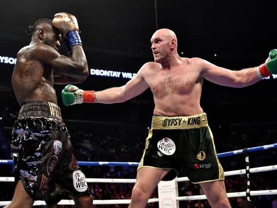 Deontay Wilder and Tyson Fury during the WBC Heavyweight Championship bout at the Staples Center in Los Angeles. Pic: Lionel Hahn/PA Wire.