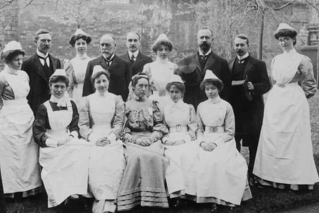 The entire medical and nursing staff in the garden of the old Wood Street Infirmary, about 1900