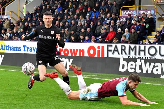 Barnsley's Kieffer Moore (left) is available to start after suffering from a back problem