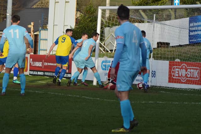 Is it or isn't it?  Stocksbridge look to have been denied a winner as Scott Ruthven's shot appears to be over the line  - Credit Gillian Handisides