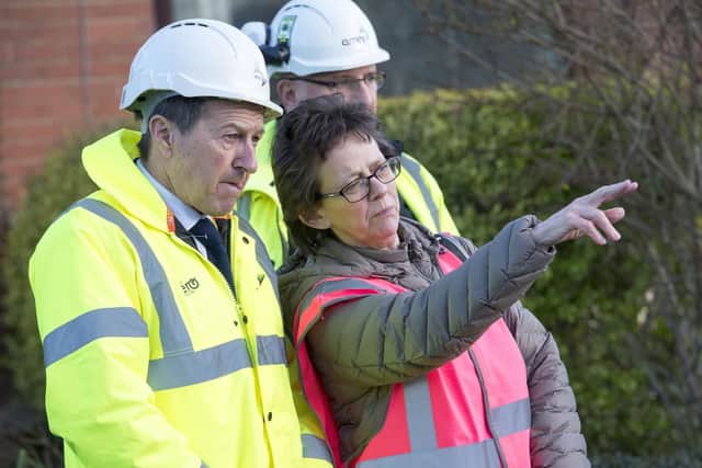 Workers from Amey prepare the road around a tree on Chatsworth Road in sheffield for remedial work
Nick Hetherington explains the course of work that will be carried out to STAG members