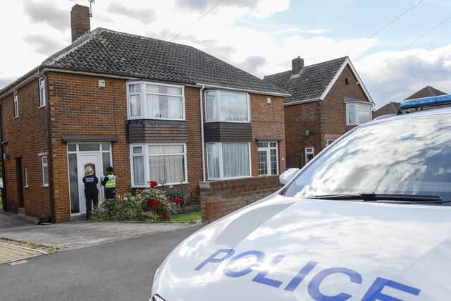 Police officers and scenes of crime officers at a property in Orgreave Lane Sheffield, where the body of an 86 year old man has been discovered.Picture Dean Atkins