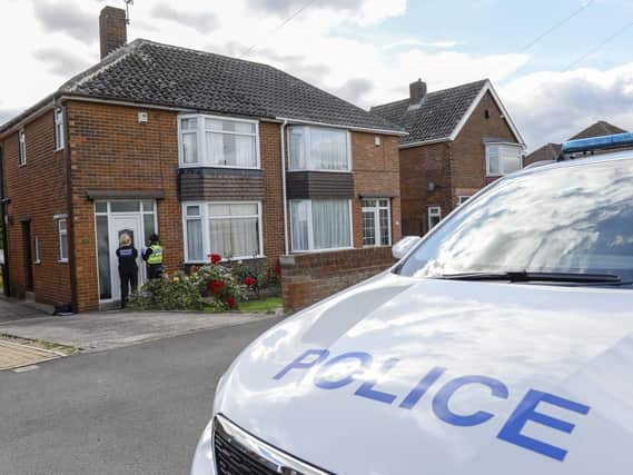 Police officers and scenes of crime officers at a property in Orgreave Lane Sheffield, where the body of an 86 year old man has been discovered.
Picture Dean Atkins