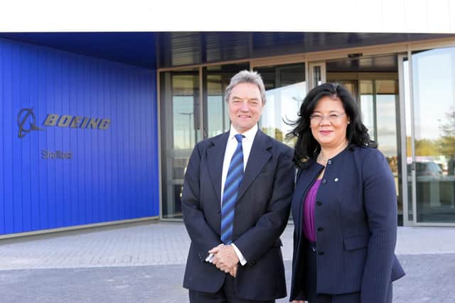 Sir Michael Arthur, President , Boeing Europe and Managing Director, Boeing UK and Ireland, pictured outside the new manufacturing facility with Jenette Ramos, Senior Vice President, Boeing Manufacturing, Supply Chain and Operations. Picture: Marie Caley