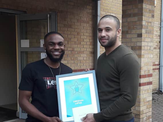 Christian Lufwa (left) received Young Person of the Year Award from Yorkshire Housing's employments and benefits advisor, Imran Hussain
