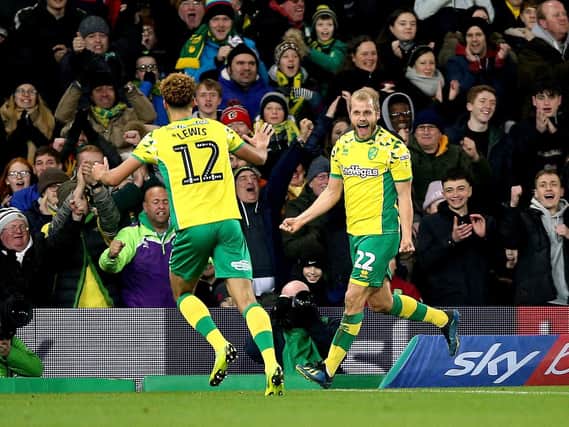 Norwich City's Teemu Pukki (right) celebrates scoring his side's first goal of the game during the Sky Bet Championship match at Carrow Road, Norwich.  Nigel French/PA Wire.