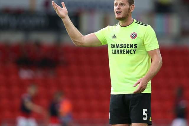 Outstanding despite defeat. Was alive to danger in first half when he came across to deny both Roberts and Routledge sights on goal and showed his ability going forward, too, with an inviting cross for Sharp. Denied McBurnie in the second half with a superb challenge