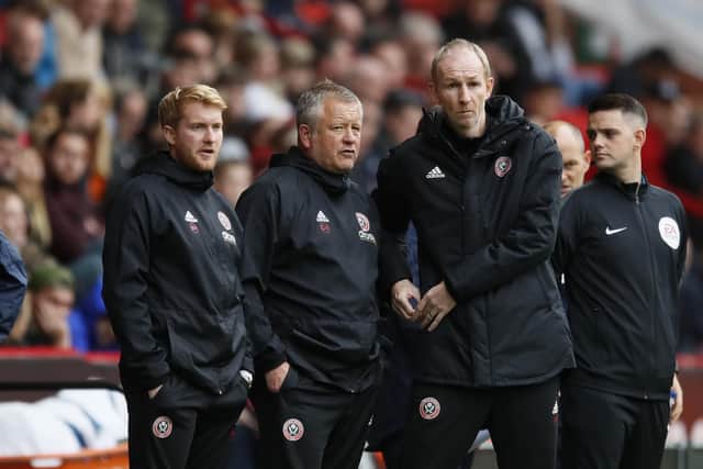 Chris Wilder (centre) and his staff are keen to shape the futures of Sheffield United's younger players: Simon Bellis/Sportimage