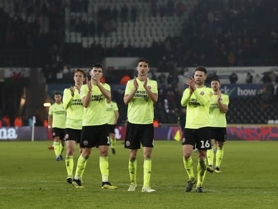 Sheffield United's players applaud the travelling fans following their defeat at Swansea City: Simon Bellis/Sportimage