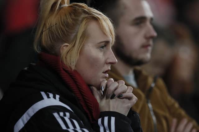 Sheffield United fans watched their team dominate the first-half but lose the second at the Liberty Stadium: Simon Bellis/Sportimage