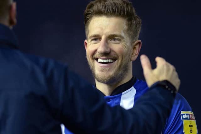Sam Hutchinson is all smiles after the Owls' win over Wigan