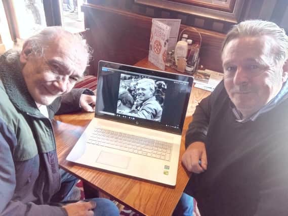 Neil Hawthorn and Giles Brearley with a picture of Mike Hawthorn, originally from Mexborough, and Britain's first Formula One World Champion in 1958. Neil is Mike's cousin.