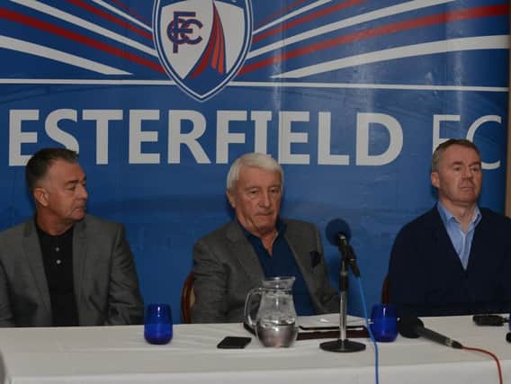 Chesterfield owner Dave Allen, flanked by manager John Sheridan (right) and assistant manager Glynn Snodin (left)