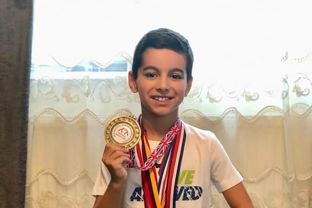Amir Abakarov, aged eight, of Sheffield, who has won gold medals in freestyle wrestling and hopes to become an Olympic champion.