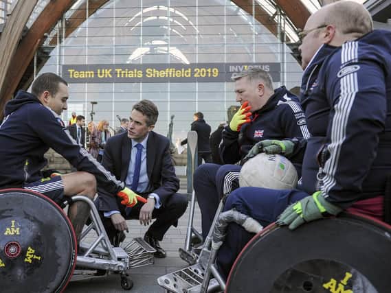 Defence Secretary Gavin Williamson chats with wheelchair basketball players at the launch of  the 2019 UK Invictus Games Trials which are to be held in Sheffield in July. Picture Scott Merrylees