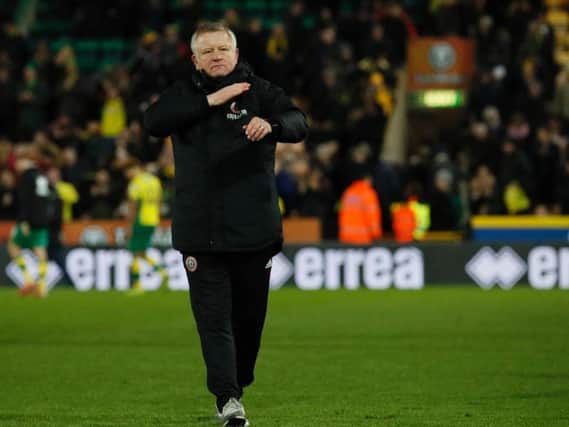 Chris Wilder salutes the fans at Norwich