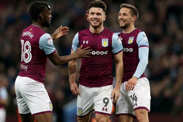 Scott Hogan (centre) is destined for Sheffield United
