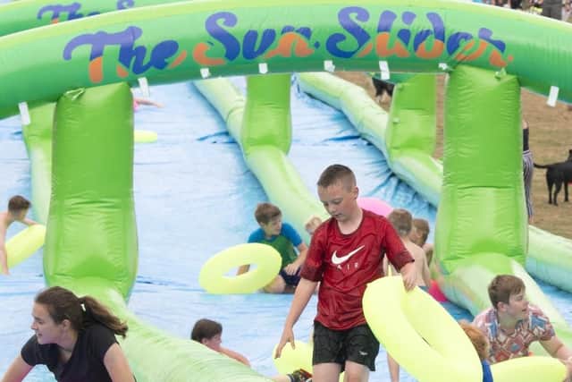 The Sun Slider waterslide at Graves Park in Sheffield last summer