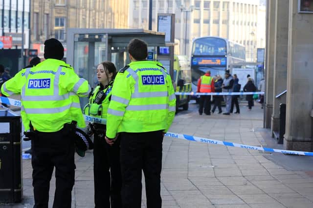 A police cordon was set up on High Street, Sheffield.