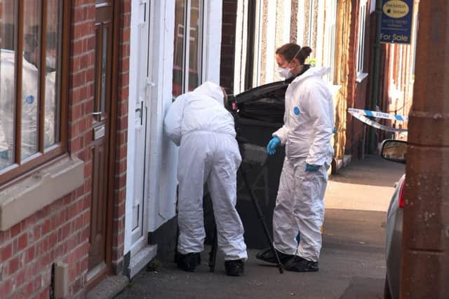 Police investigate a suspected crime scene on Graham Street, Ilkeston, after a suspected assault.