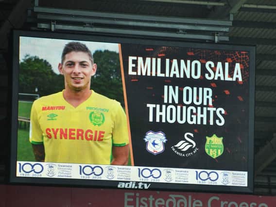 A tribute to Cardiff City striker Emiliano Sala shown on the big screen during the FA Cup fourth round match at the Liberty Stadium, Swansea. Wreckage from the plane which disappeared with Cardiff City footballer Emiliano Sala and pilot David Ibbotson on board was found in the English Channel Simon Galloway/PA Wire
