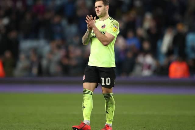 Hat trick hero Billy Sharp cannot hide his disappointment after the Blades are pegged back late at Aston Villa