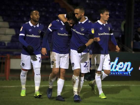 Oldham Athletic's Jose Baxter (second left) celebrates scoring his side's first goal of the game during the Sky Bet League Two match at Boundary Park, Oldham.  Simon Cooper/PA Wire.