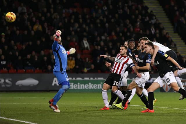 Richard Stearman of Sheffield Utd scores the winning goal during the Sky Bet Championship match at the Bramall Lane Stadium, Sheffield. Picture date: 11th February 2019. Picture credit should read: James Wilson/Sportimage