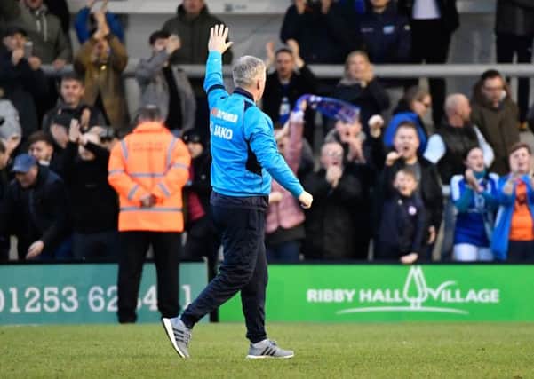 Chesterfield manager John Sheridan salutes the large group of travelling fans after their 0-1 win at AFC Fylde: Picture by Steve Flynn/AHPIX.com, Football: Vanarama National League match AFC Fylde -V- Chesterfield FC at Mill Farm, Kirkham, Lancashire, England on copyright picture Howard Roe 07973 739229