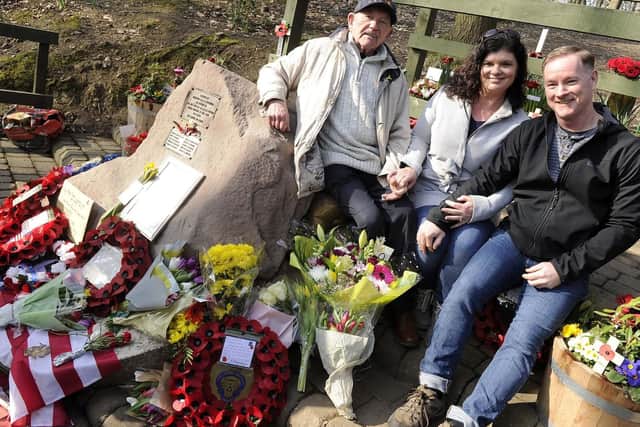 Pictured is Tony Foulds sat on his beloved memorial with visitors from New York Steven and Tina Bartlett at the Mi Amigo Memorial Service, Endcliffe Park