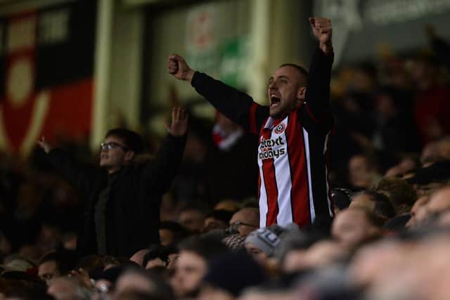 A Sheffield United fan sings during the Sky Bet Championship match between Sheffield United and Sheffield Wednesday at Bramall Lane  (Photo by Nathan Stirk/Getty Images)