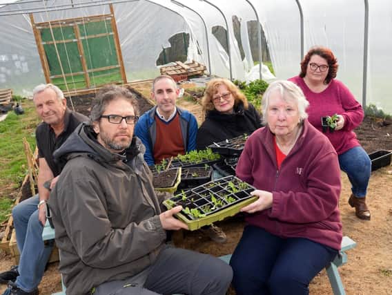 Kim Hinchliffe, Health Practitioner, pictured with volunteers l-r Tony Slack, James Starky, Anna Scislowska, Sandra Billard and Grace Collins. Picture: Marie Caley NDFP-28-02-19-HerdingsCommunity-2