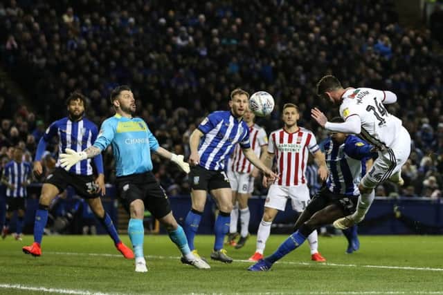 Gary Madine's early header is saved by Keiren Westwood