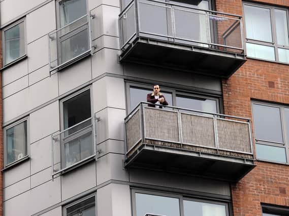 Pictured is William Martin who has concerns about the cladding on the Metis tower-block at the corner of West Bar and Scotland Street in Sheffield. Picture: Steve Ellis