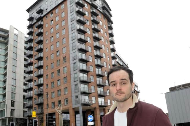 Pictured is William Martin who has concerns about the cladding on the Metis tower-block at the corner of West Bar and Scotland Street in Sheffield. Picture: Steve Ellis