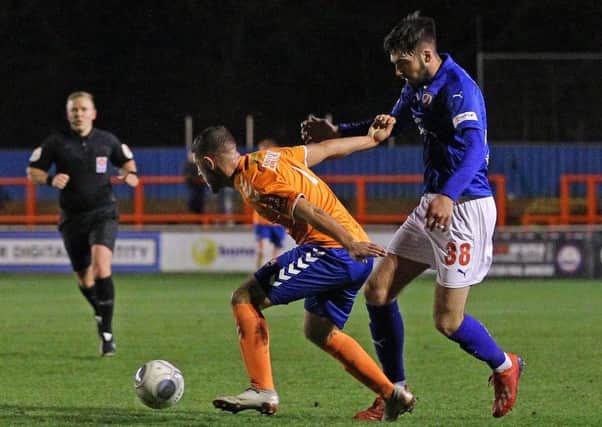 Picture by Gareth Williams/AHPIX.com; Football; Vanarama National League; Braintree Town v Chesterfield FC; 5/3/2019 KO 19.45; The Ironmongery Direct Stadium; copyright picture; Howard Roe/AHPIX.com; Spireites' Ellis Chapman takes on Braintree's Andrew Eleftheriou