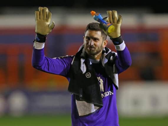 Shwan Jalal salutes the Chesterfield fans after last night's 3-1 win at Braintree.