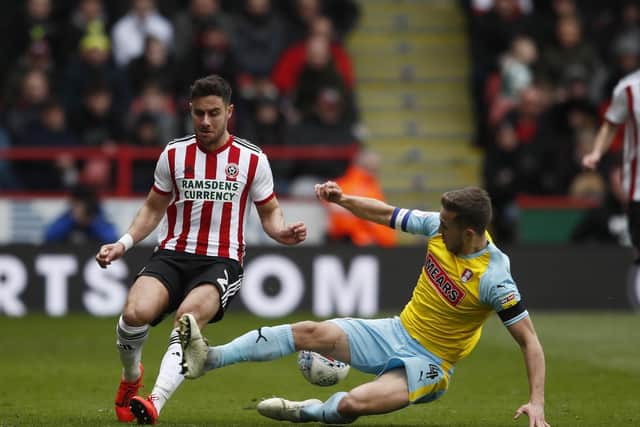 Will Vaulks was sent off for this tackle on George Baldock: Simon Bellis/Sportimage