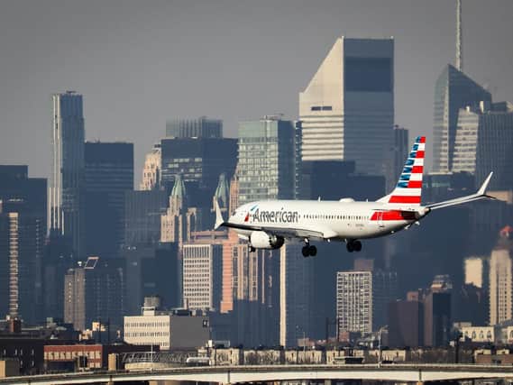 NEW YORK, NY - MARCH 11: An American Airlines Boeing 737 Max 8, on a flight from Miami to New York City, lands at LaGuardia Airport on Monday morning, March 11, 2019 in the Queens borough of New York City. Boeing's stock dropped more than 12 percent at the open on Monday, a day after a second deadly crash involving the Boeing 737 Max 8, the newest version of its most popular jetliner. (Photo by Drew Angerer/Getty Images)