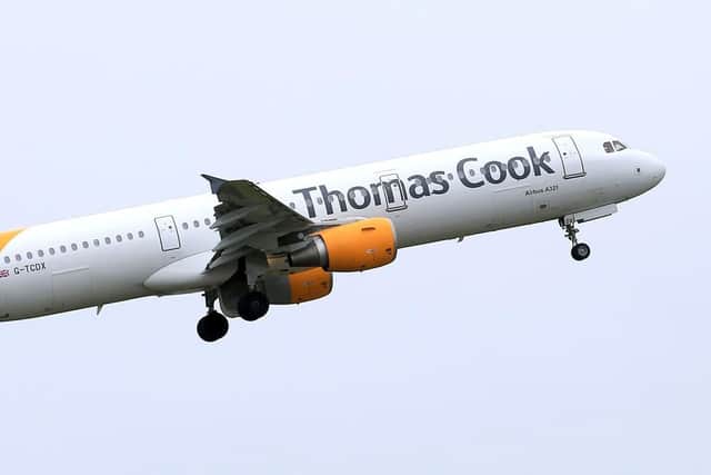 Thomas Cook plane taking off - Tim Goode/PA Wire