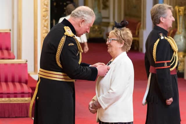 Maureen Horton from Sheffield is made an MBEby the Prince of Wales at Buckingham Palace. Picture: Dominic Lipinski/PA Wire