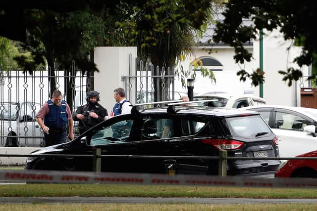 Police officers at the Masjid al Noor mosque after the mass shootings in Christchurch (pic: TESSA BURROWS/AFP/Getty Images)