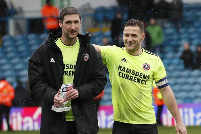 Chris Basham and Billy Sharp are all smiles after the win over Leeds