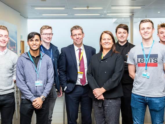 Apprentices with the director of the AMRC Training Centre Nikki Jones and University of Sheffield Vice-Chancellor, Koen Lamberts.