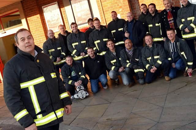 Neil Carbutt pictured with firefighters before a previous protest over cuts in 2016. Picture: Marie Caley NDFP Firefighters Protest MC 1