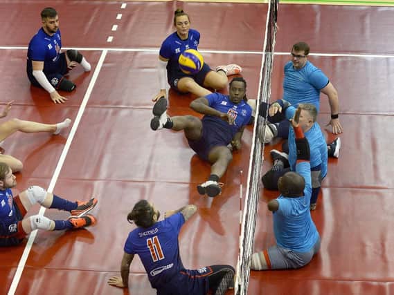 A sitting volleyball match between Team UK and Sheffield Volleyball Club.