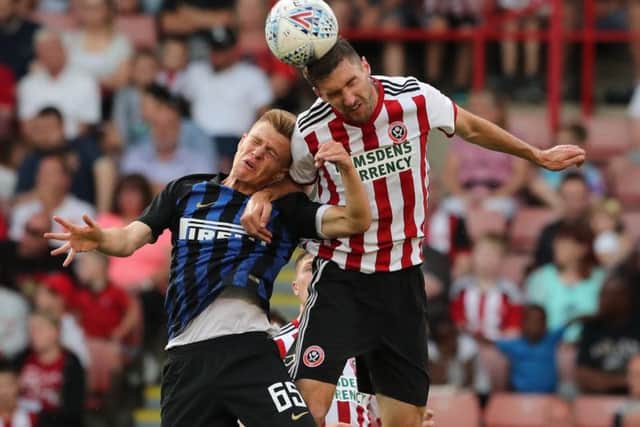 Alongside the rest of his defence, did well to keep the lively Adams off the scoresheet. Almost helped make the breakthrough when he headed Stevens' deep cross back across goal