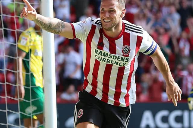 Battled hard without a great deal of clear cut chances and had a shot blocked early in the game. Linked up well with first McGoldrick and then Madine after he came off the bench