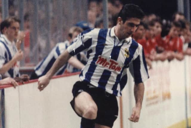 Eric Cantona playing for Sheffield Wednesday in an indoor game in 1992